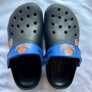 NY Knicks Crocs in new condition. Size 3 men’s/5 women’s.
